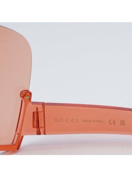 Gucci GG1631S 001 Sunglasses Transparent Red Shield Frame, Light Red Lenses main image 6